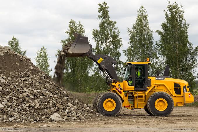Construction site with various equipment in use