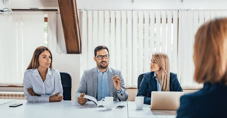 Recruitment specialist consulting with a professional candidate