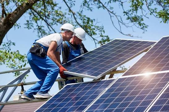 Modern home with solar energy and electric vehicle charging equipment