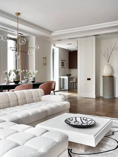 Warm living room interior with carefully selected furniture and lighting