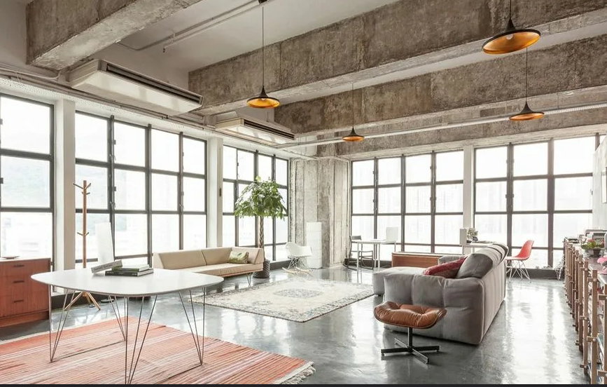 Open industrial loft kitchen and lounge in Marseille